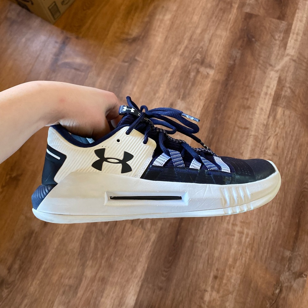 Woman’s navy Under Armor shoes